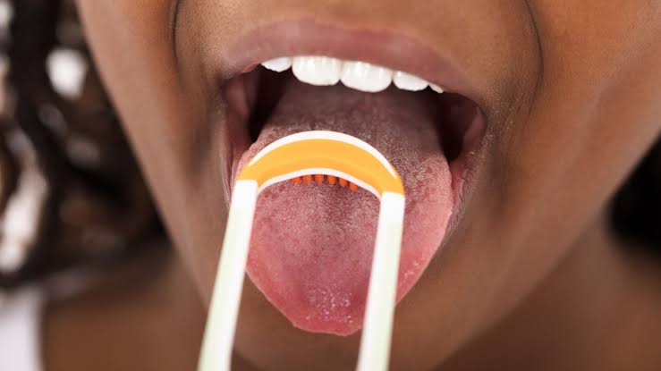 3 Reasons To Add Tongue Scraping To Your Daily Routine