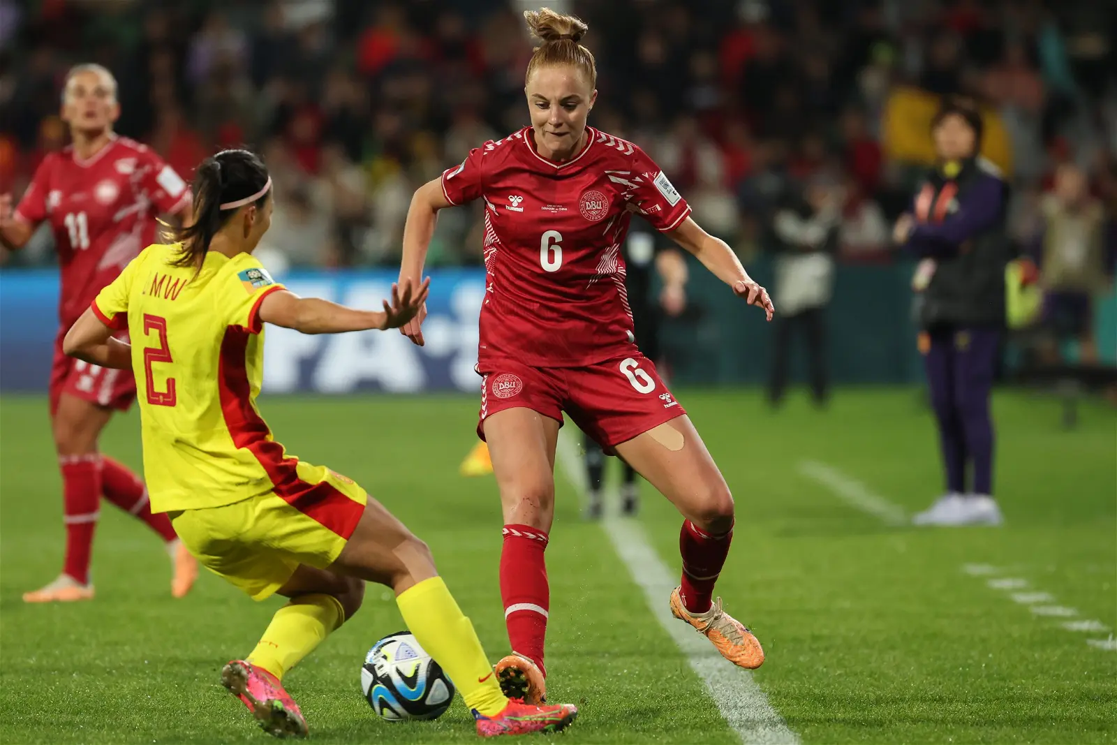 Denmark Tops Group D With 90th Minute Winner Over China