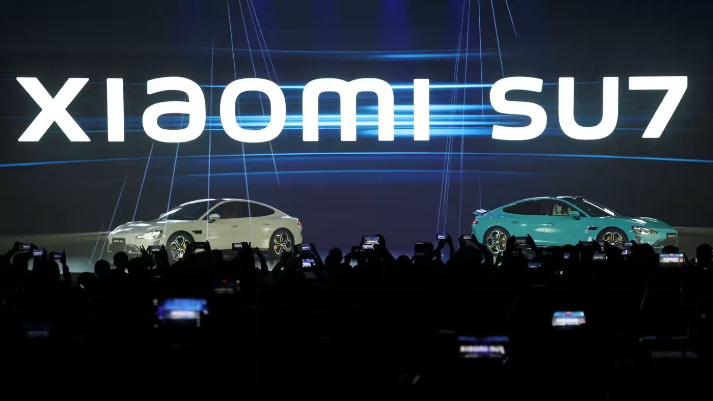 Xiaomi Unveils First Electric Vehicle, Aiming To Rival Tesla And Porsche