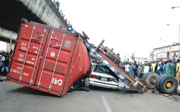 Tragedy Strikes Lagos As Container Truck Crushes Tricycle